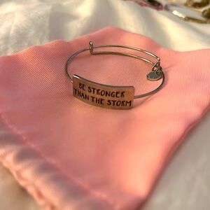 “Be stronger than the storm.” Silver bracelet